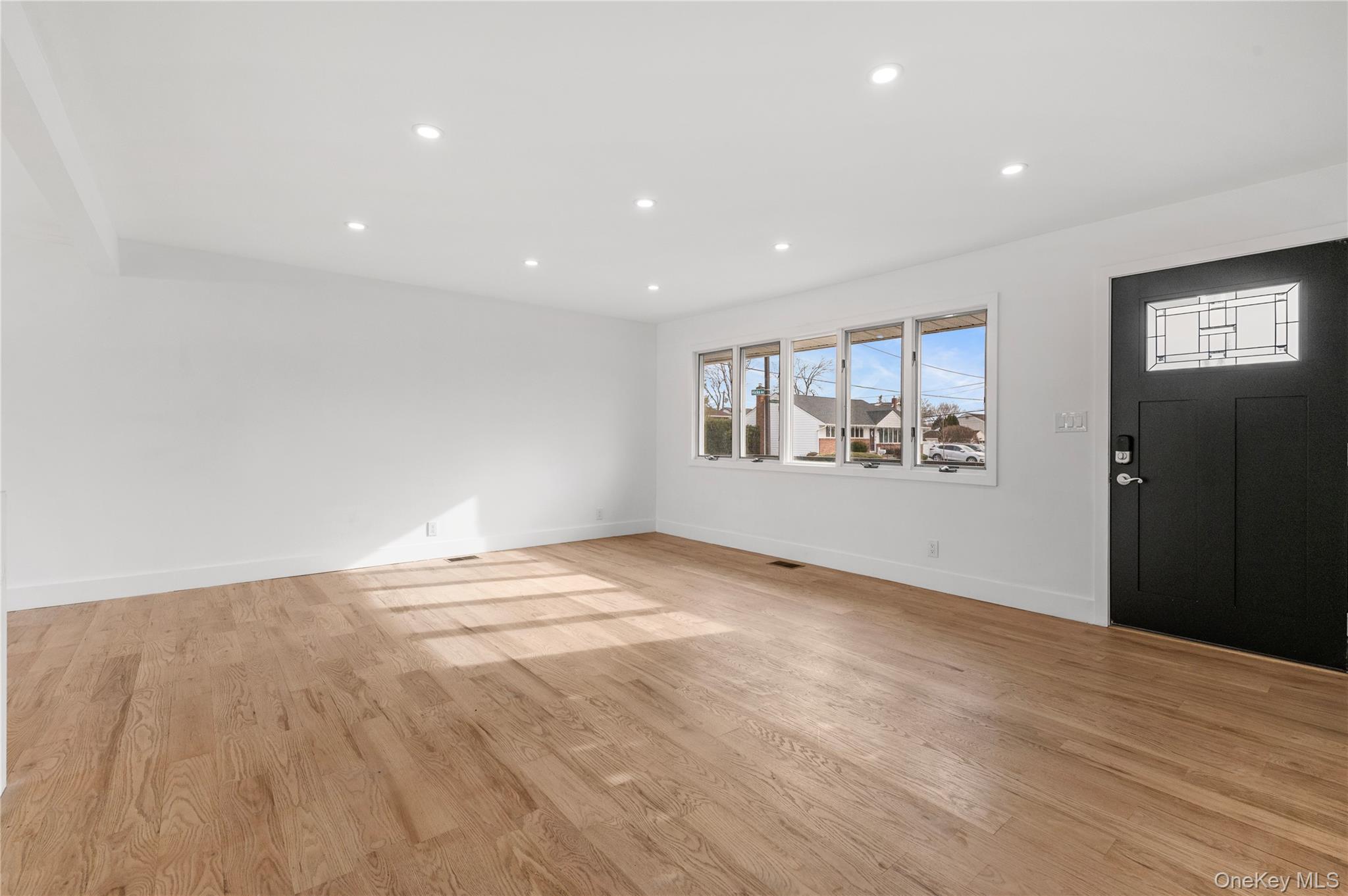 19 Hicks Avenue Syosset, NY 11791 - Photo 3 of 30 a view of an empty room with a window