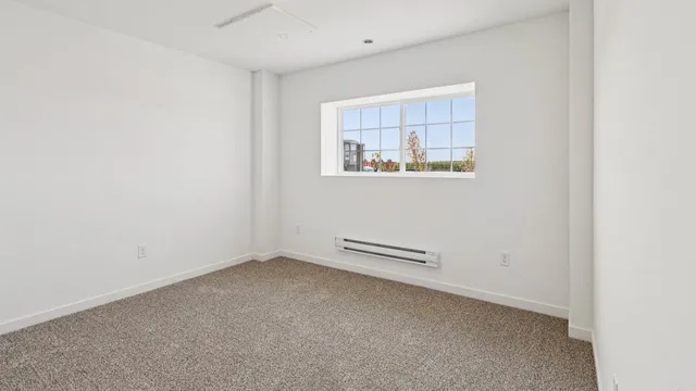 a view of a house with a yard porch and sitting area