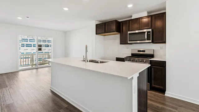 a kitchen with a appliances