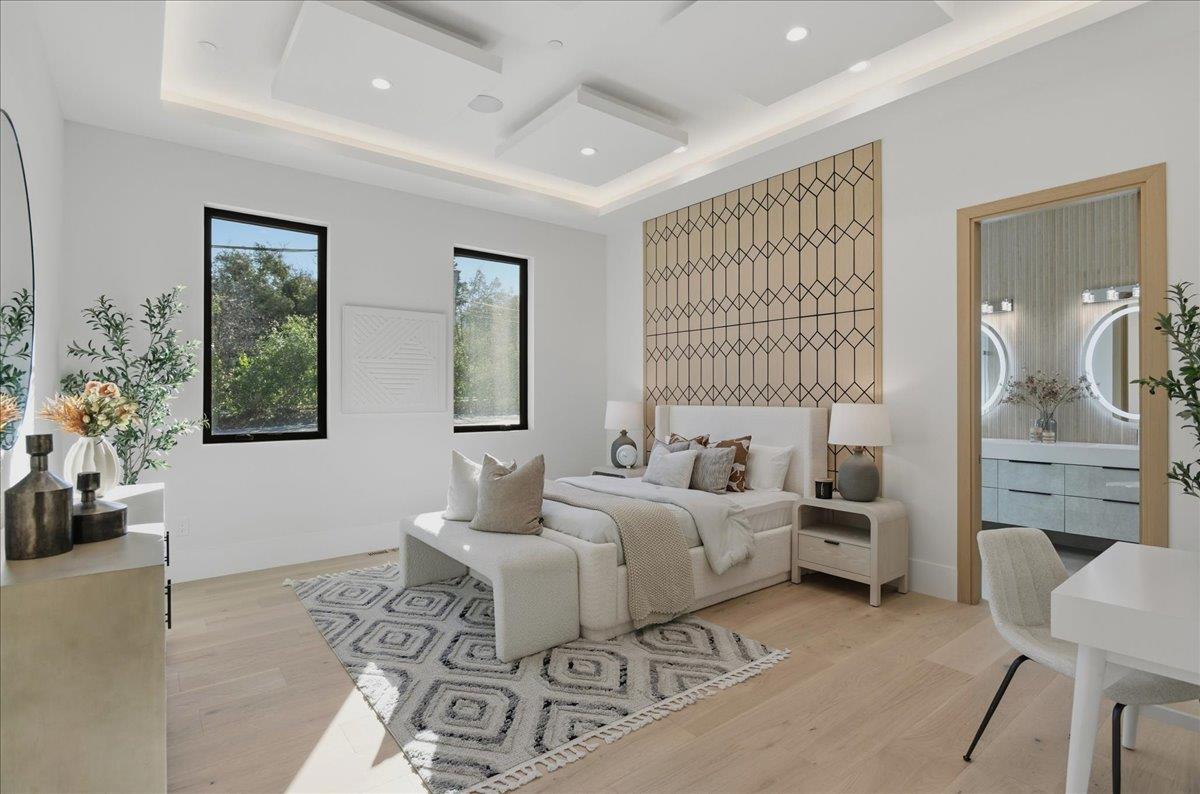 19315 San Marcos Road Saratoga, CA 95070 - Photo 26 of 52 a spacious bedroom with a bed a couch and a potted plant