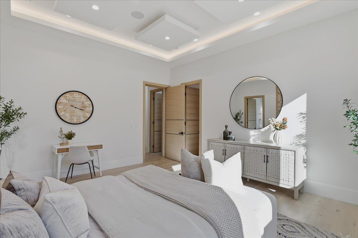 19315 San Marcos Road Saratoga, CA 95070 - Photo 27 of 52 a bed room with a bed mirror and a window