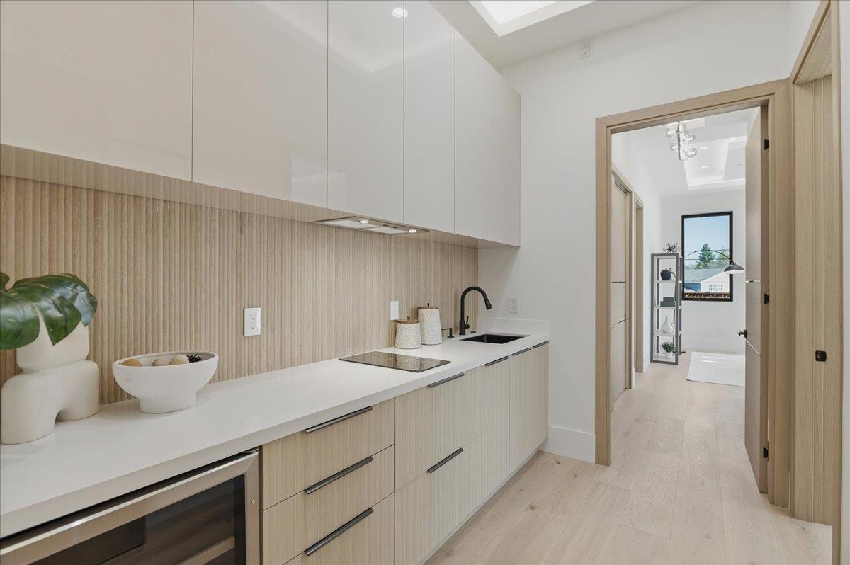19315 San Marcos Road Saratoga, CA 95070 - Photo 35 of 52 a kitchen with a sink and cabinets