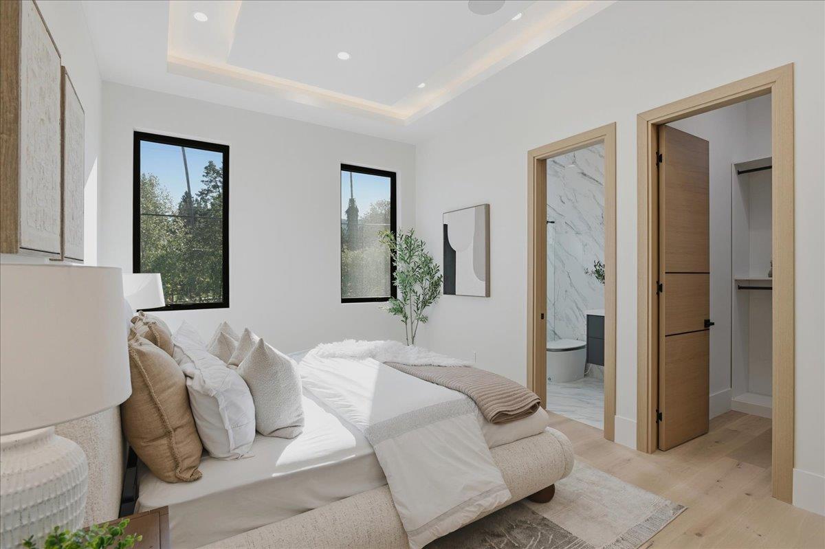 19315 San Marcos Road Saratoga, CA 95070 - Photo 39 of 52 a bedroom with a bed and a mirror