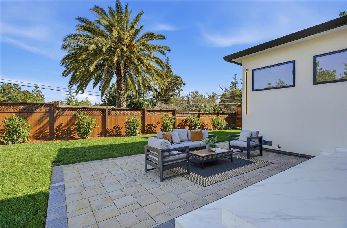 19315 San Marcos Road Saratoga, CA 95070 - Photo 43 of 52 a swimming pool with outdoor seating and garden