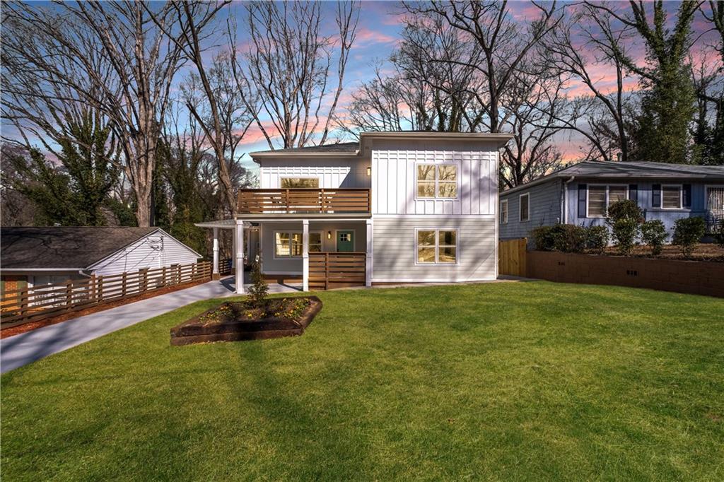 1233 Richland Road Southwest Atlanta, GA 30310 - Photo 1 of 1 a front view of a house with garden