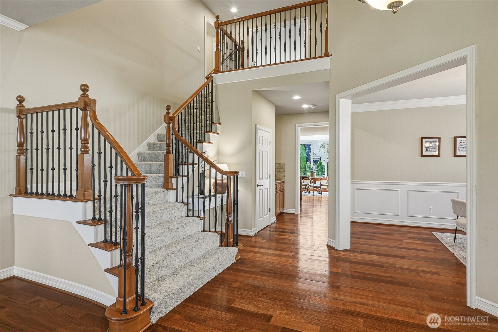 3932 221st Place Southeast Bothell, WA 98021 - Photo 5 of 36 a view of staircase with wooden floor and a rug
