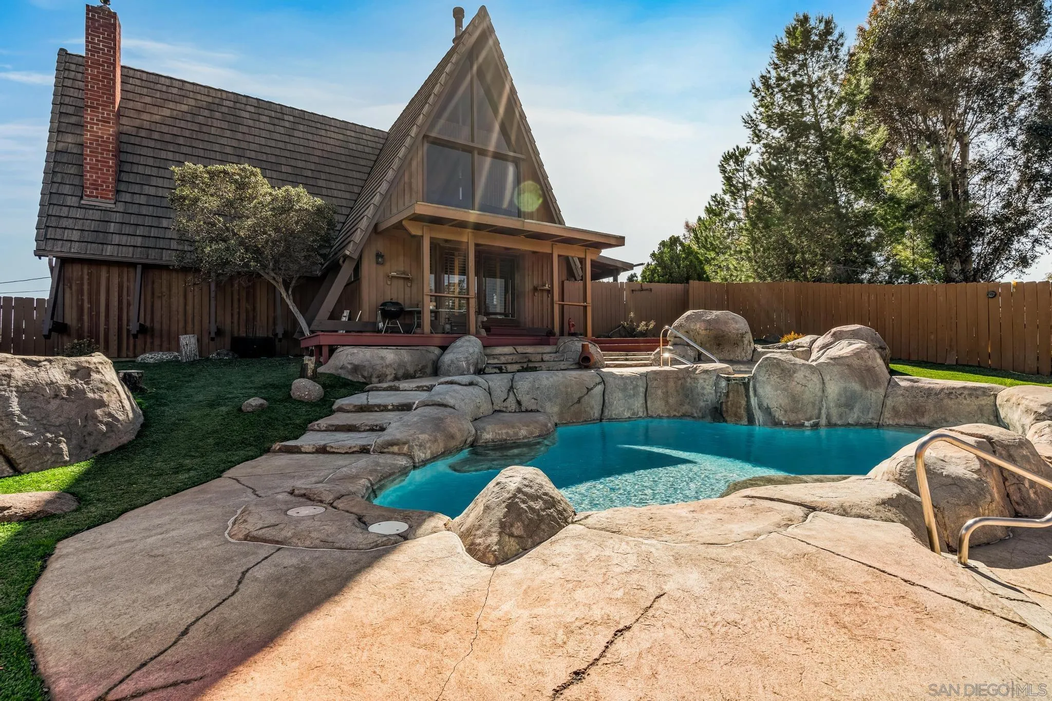 1539 South Grade Road Alpine, CA 91901 - Photo 35 of 61 a view of swimming pool with lawn chairs and plants