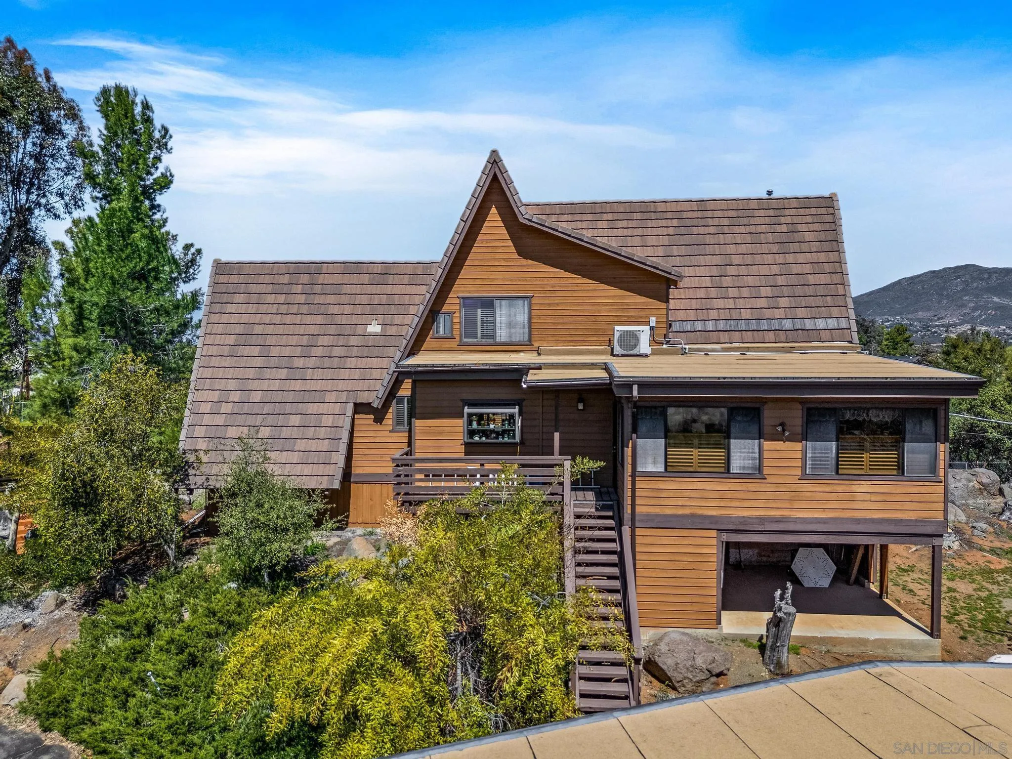 1539 South Grade Road Alpine, CA 91901 - Photo 46 of 61 a view of a house with brick walls and potted plants