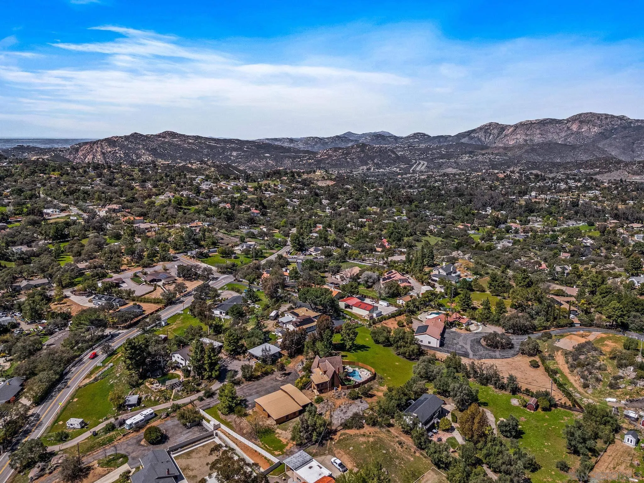1539 South Grade Road Alpine, CA 91901 - Photo 54 of 61 an aerial view of houses covered in trees