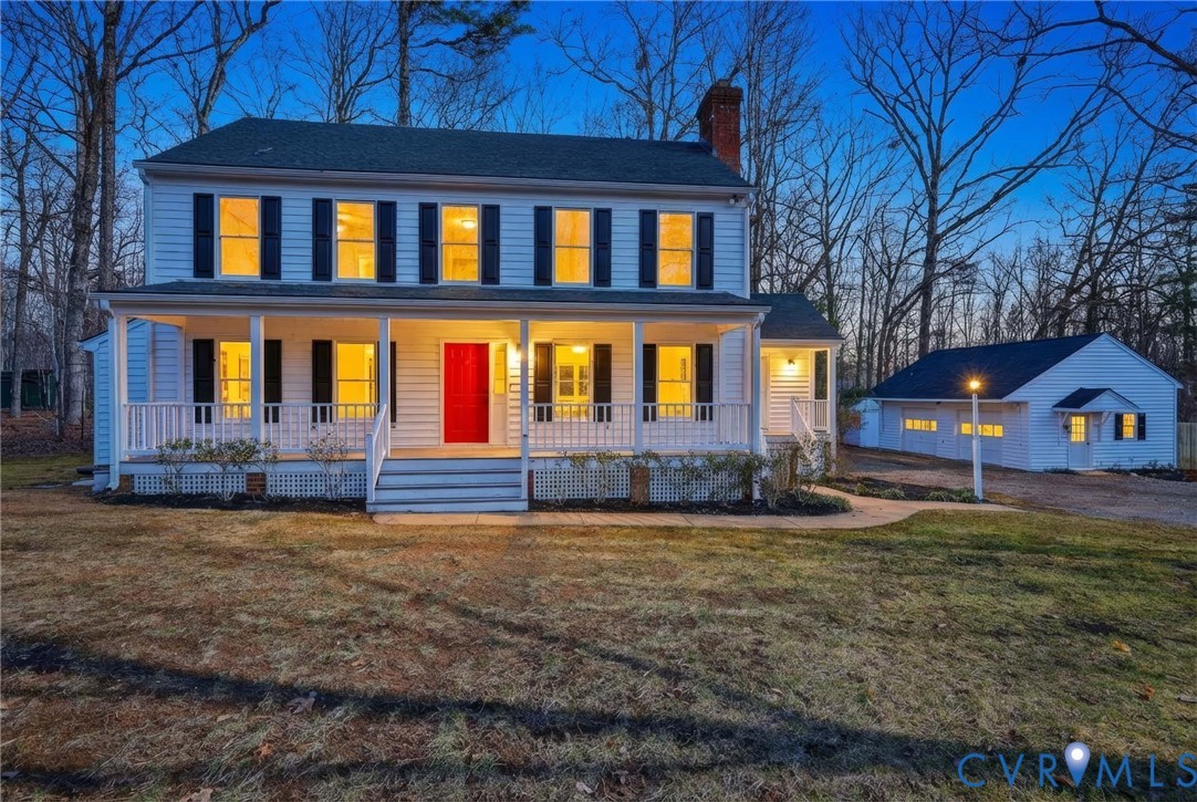 3264 Sherwood Ridge Way Powhatan, VA 23139 - Photo 2 of 40 a house view with a garden space