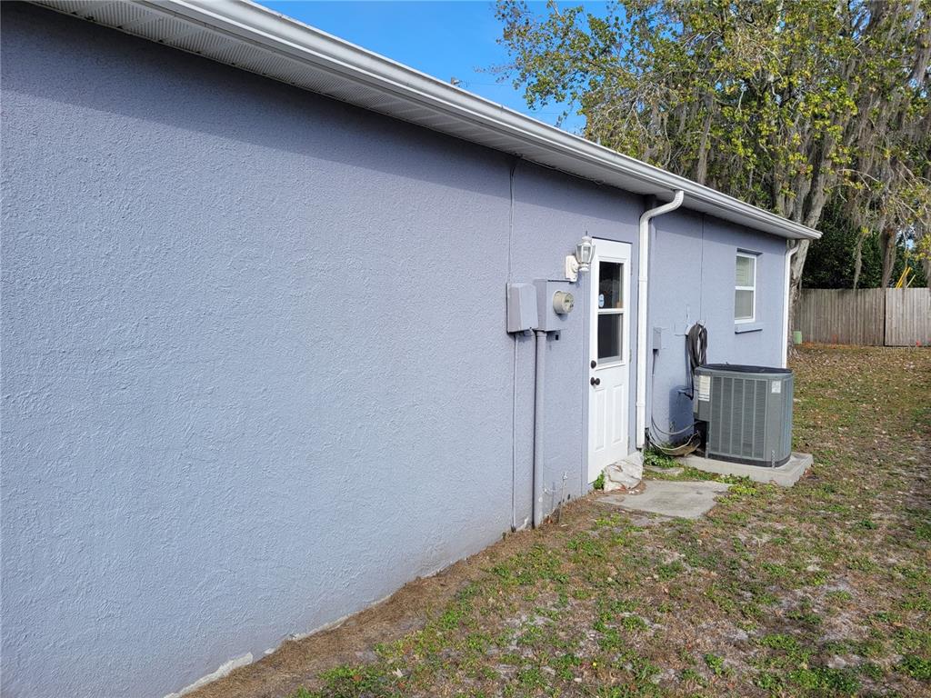 7809 Rusty Oak Drive New Port Richey, FL 34653 - Photo 22 of 24 Side of Home