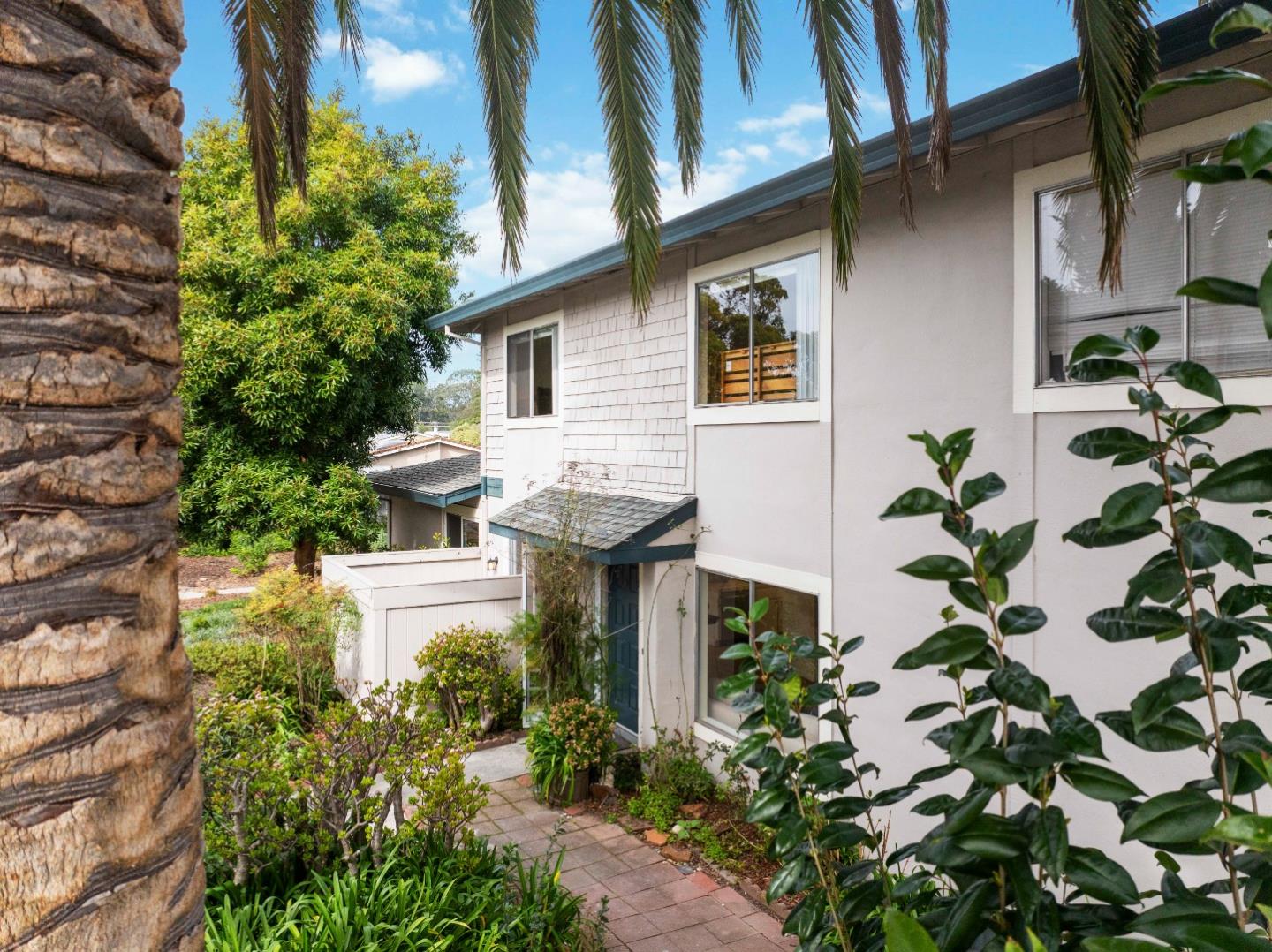 4237 Starboard Court Soquel, CA 95073 - Photo 1 of 26 a view of a house with potted plants and a fountain