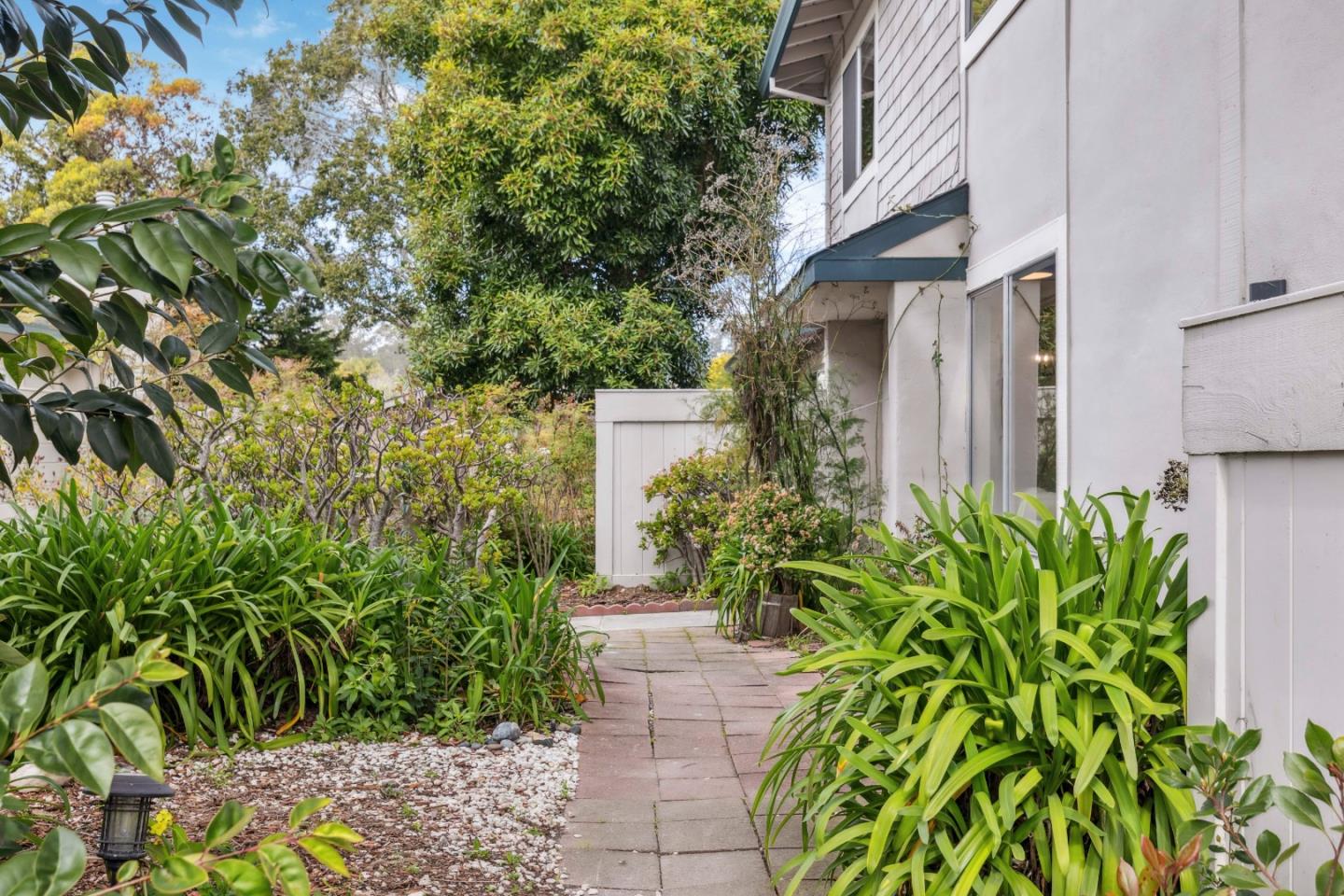 4237 Starboard Court Soquel, CA 95073 - Photo 17 of 26 a view of a pathway with plants and flowers
