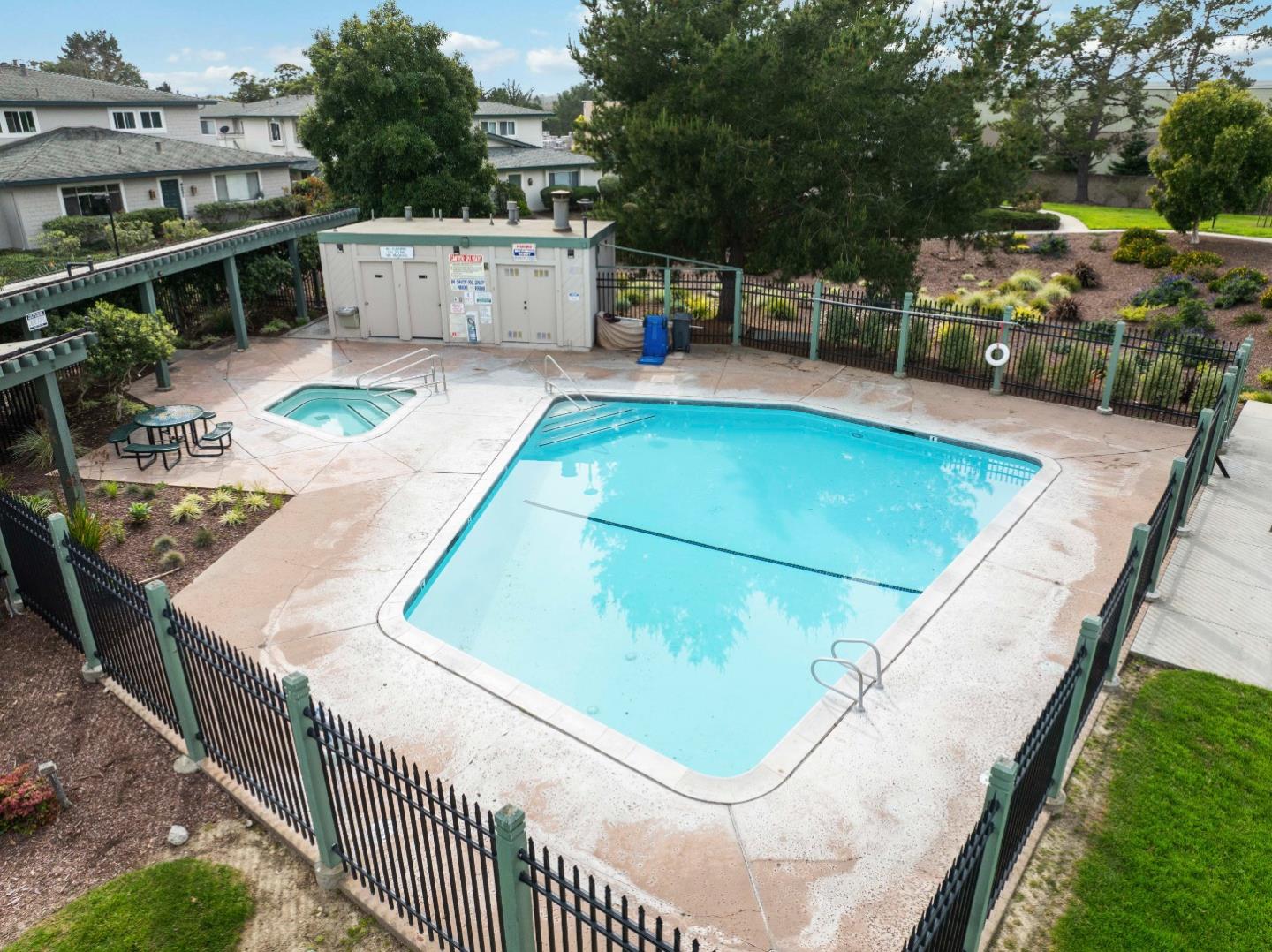 4237 Starboard Court Soquel, CA 95073 - Photo 20 of 26 a view of a swimming pool with a patio and fire pit