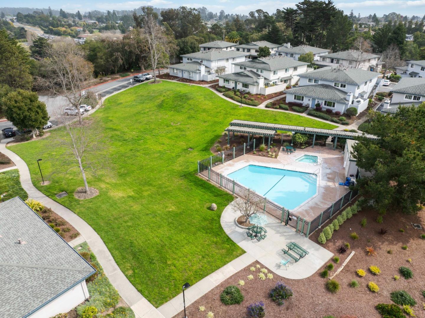 4237 Starboard Court Soquel, CA 95073 - Photo 22 of 26 a view of a swimming pool with a patio and garden