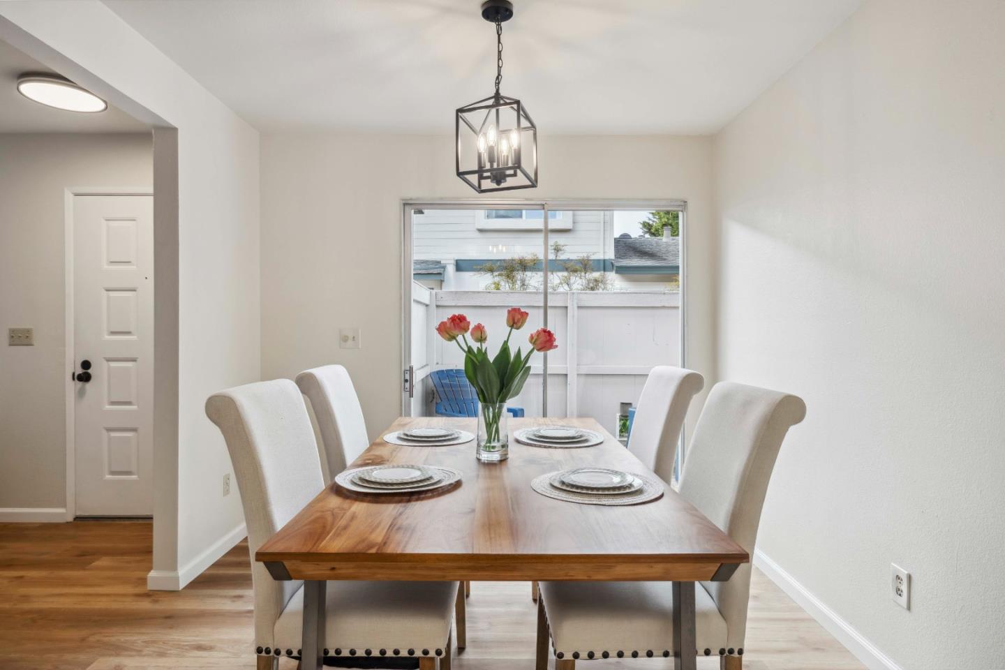 4237 Starboard Court Soquel, CA 95073 - Photo 4 of 26 a view of a dining room with furniture a rug and wooden floor