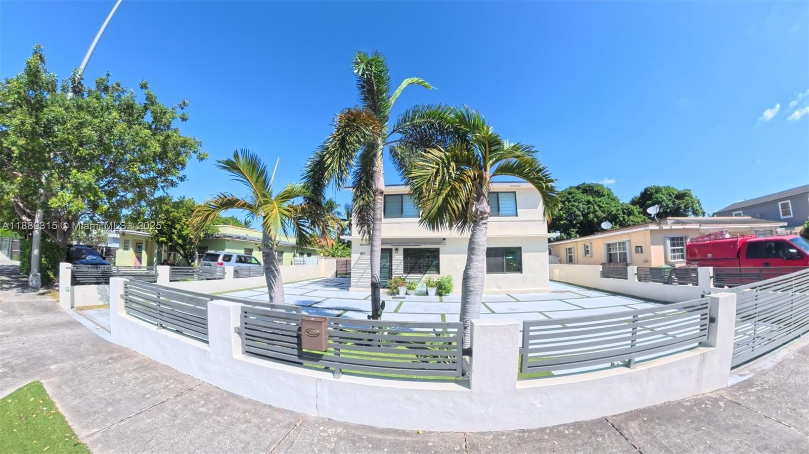 851 East 17th Street, Unit B Hialeah, FL 33010 - Photo 2 of 13 a front view of a house with a porch