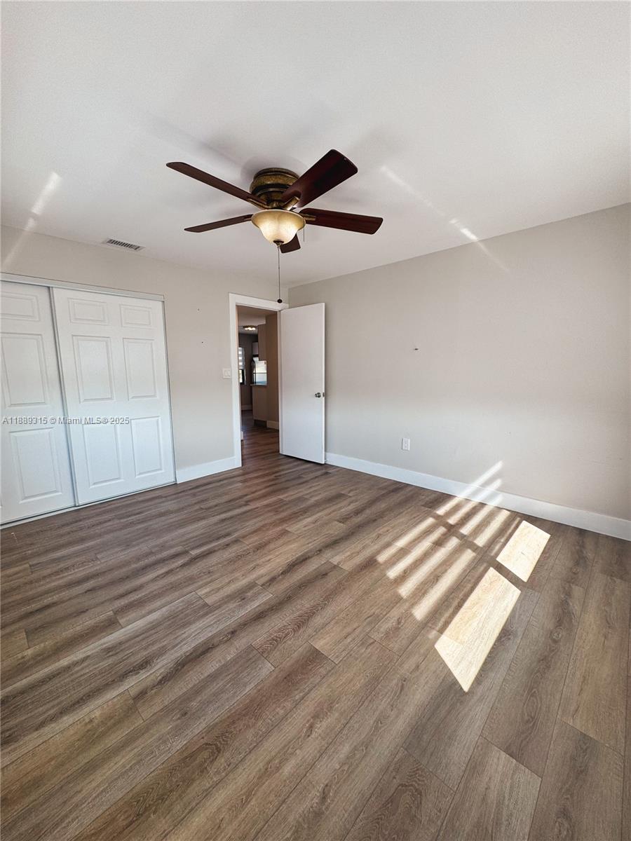 851 East 17th Street, Unit B Hialeah, FL 33010 - Photo 7 of 13 a view of empty room with wooden floor