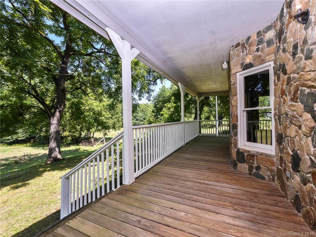 3450 Center Road Chester, SC 29706 - Photo 8 of 47 a view of a porch with wooden floor and fence