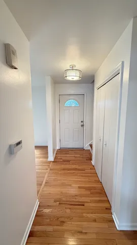 a view of a livingroom from a hallway
