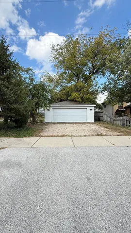 a view of parking space with city view