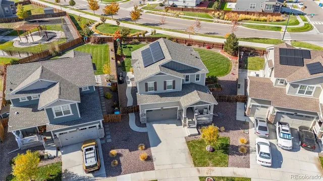 a front view of a building with outdoor seating