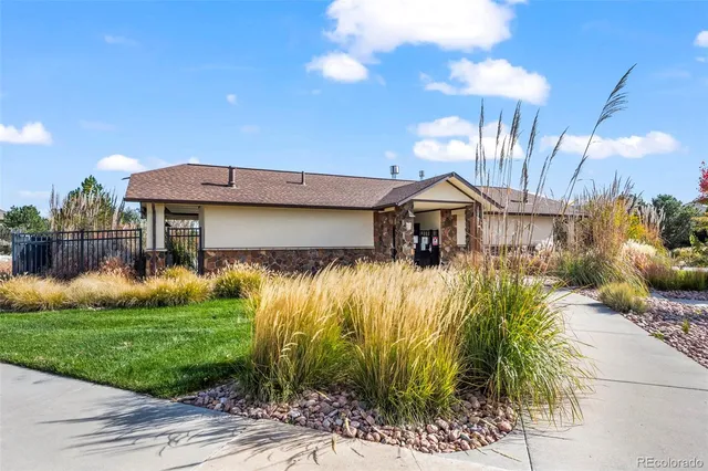 a view of a park with swings and slides