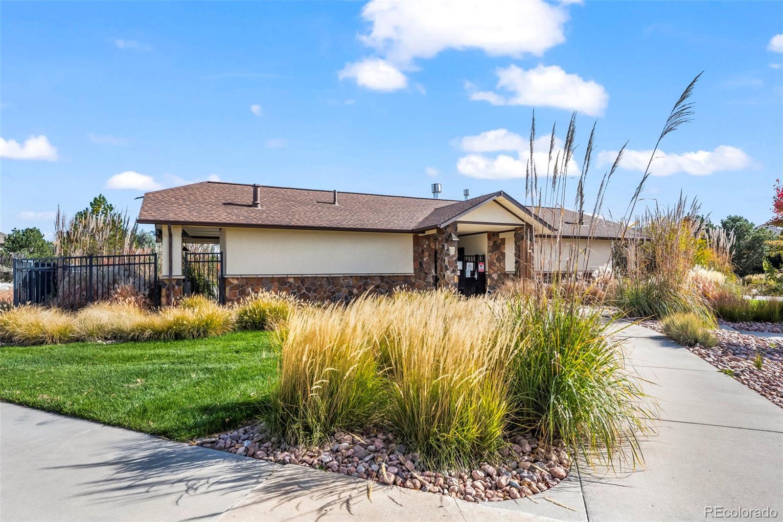 10985 Wheeling Street Commerce City, CO 80022 - Photo 40 of 45 a front view of house with yard