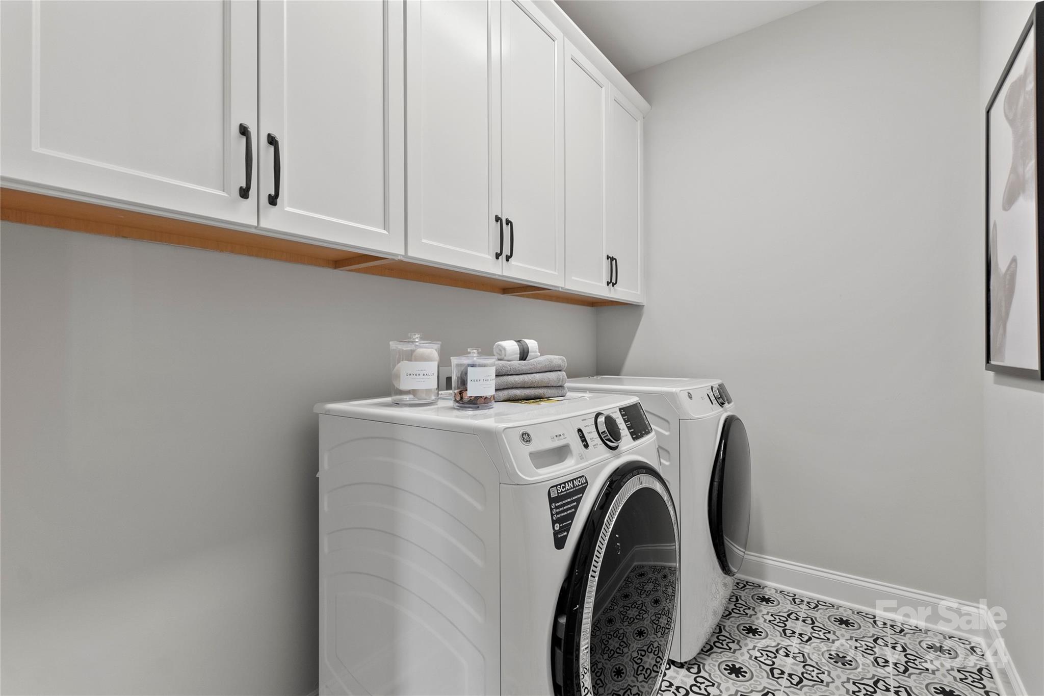 1395 Hubert Graham Way Tega Cay, SC 29708 - Photo 29 of 40 a utility room with dryer and washer