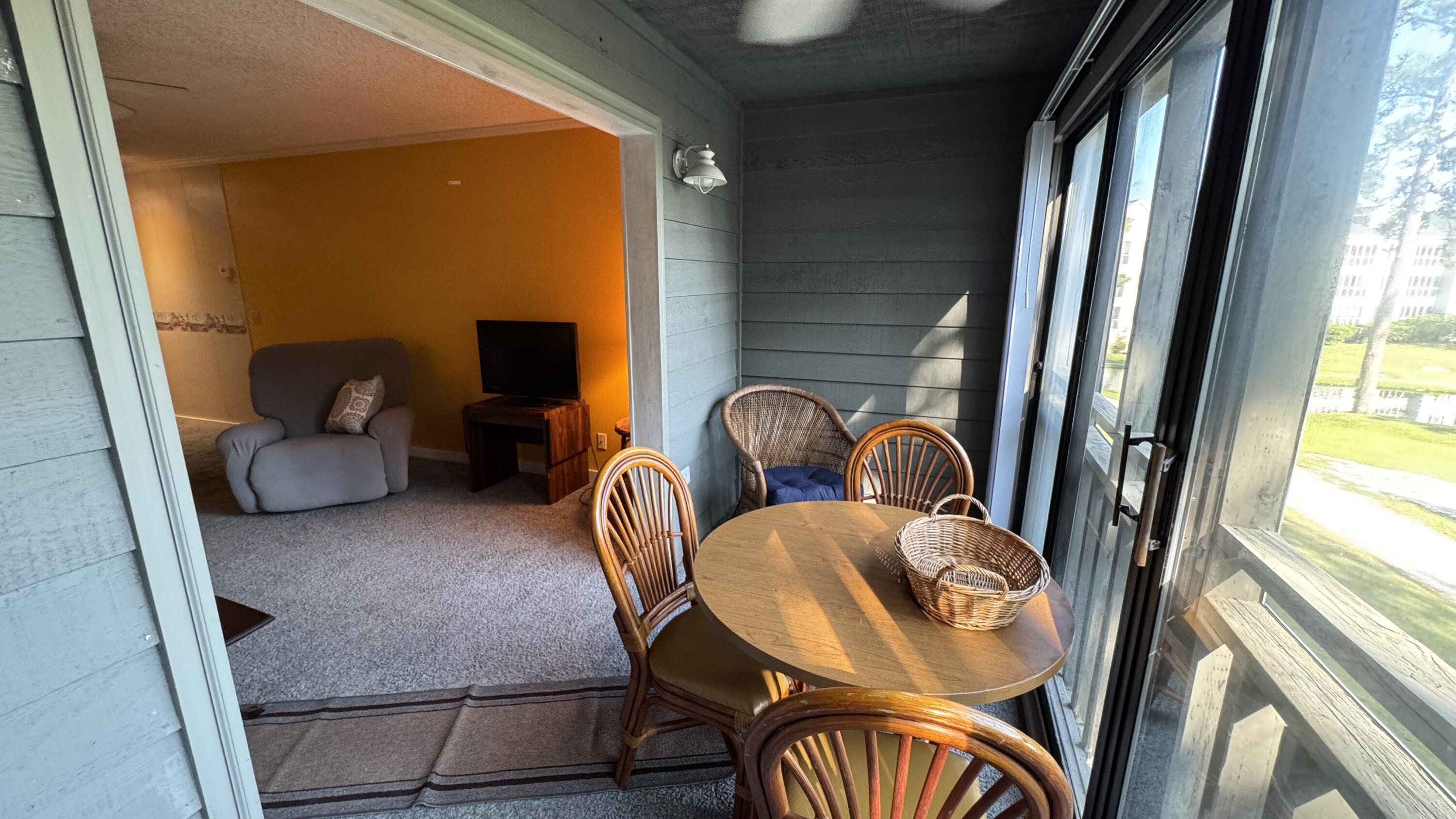 1203 Cypress Pointe, Unit A203 Manning, SC 29102 - Photo 13 of 25 Enclosed Deck