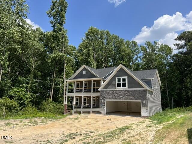 119 Big Pine Road Clayton, NC 27520 - Photo 21 of 21 a front view of a house with a garden and trees