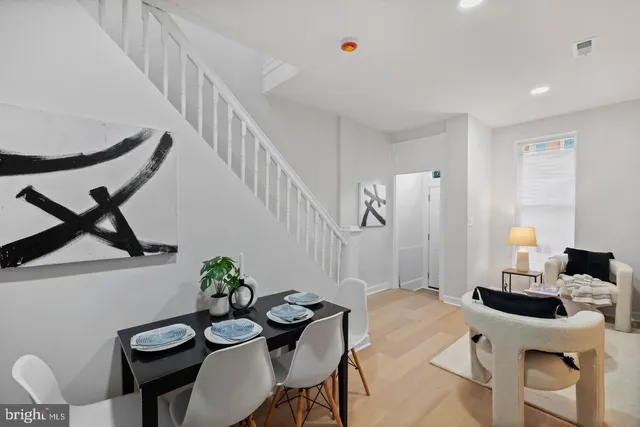 a view of a livingroom with furniture and furniture