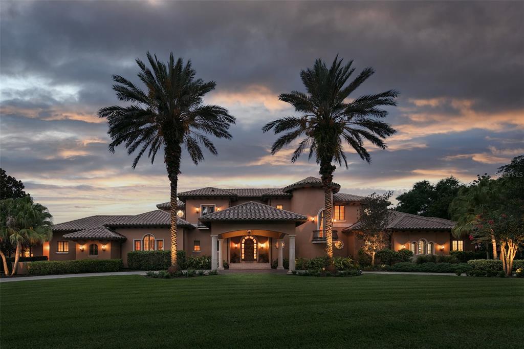 9718 Chestnut Ridge Drive Windermere, FL 34786 - Photo 1 of 1 This sprawling estate spans more than 11,000 square feet along the shores of Lake Bessie.