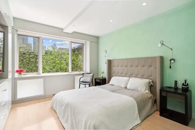 a kitchen with a sink a stove and cabinets