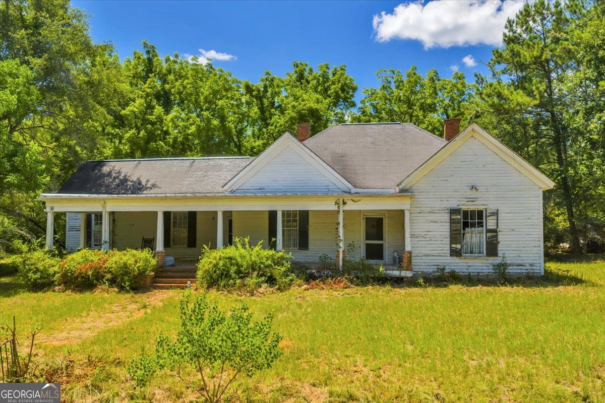 3442 Highway 83 Forsyth, GA 31029 - Photo 17 of 19 a view of a house with a yard