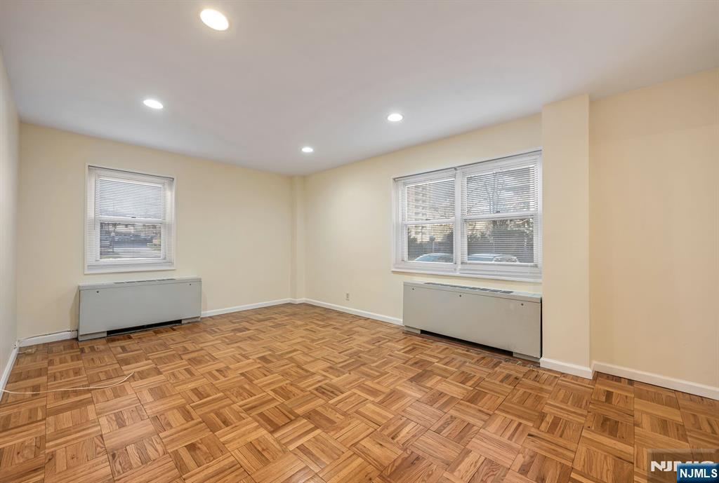 280 Prospect Avenue, Unit 1B Hackensack, NJ 07601 - Photo 17 of 36 a view of an empty room with a window