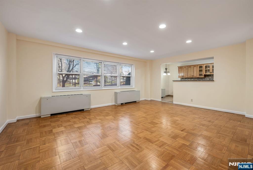 280 Prospect Avenue, Unit 1B Hackensack, NJ 07601 - Photo 9 of 36 a view of an empty room with a window