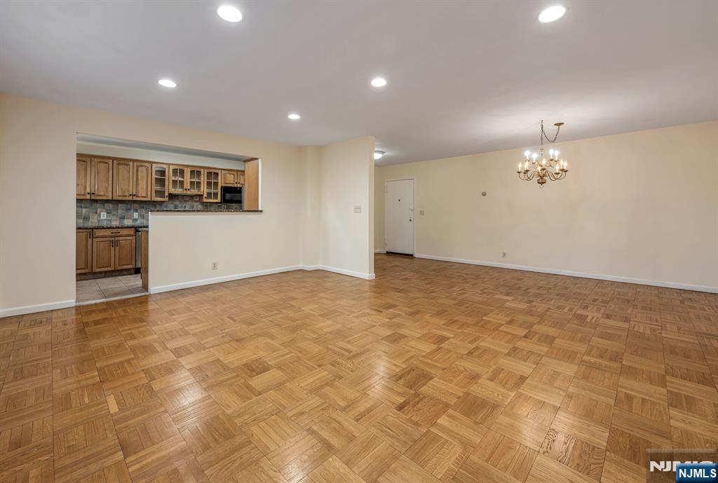 280 Prospect Avenue, Unit 1B Hackensack, NJ 07601 - Photo 10 of 36 a view of a livingroom with kitchen