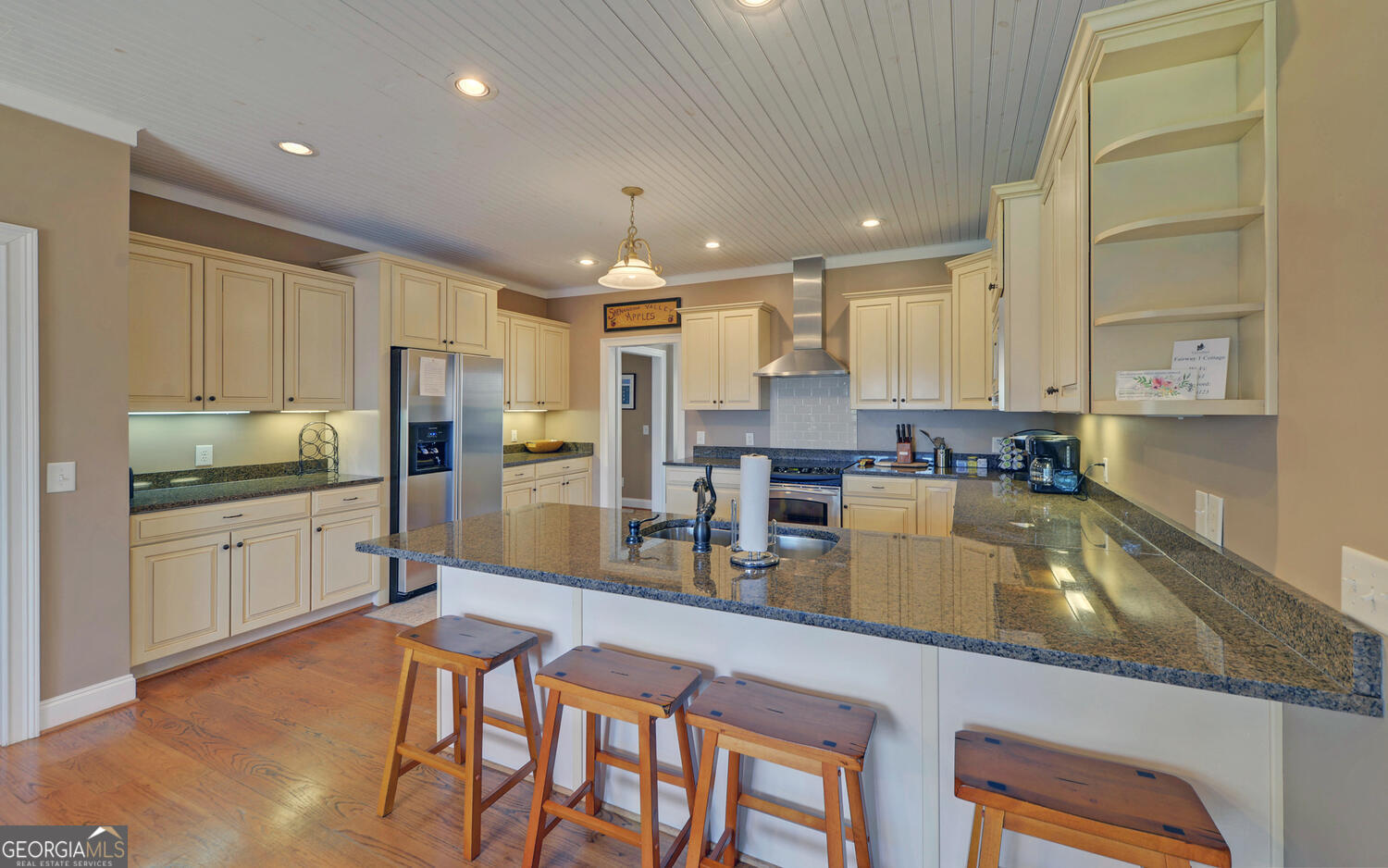 29 Cottage Lane Toccoa, GA 30577 - Photo 12 of 49 a kitchen with stainless steel appliances granite countertop a stove refrigerator sink and cabinets