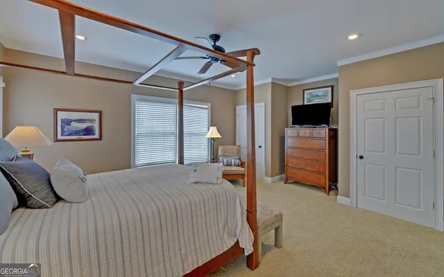 a bathroom with a granite countertop sink a mirror and a bathtub