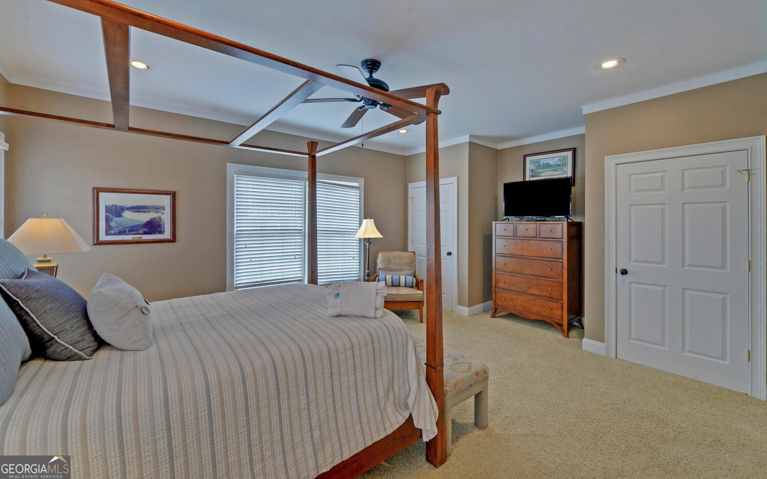 29 Cottage Lane Toccoa, GA 30577 - Photo 16 of 49 a bedroom with a bed and a chandelier