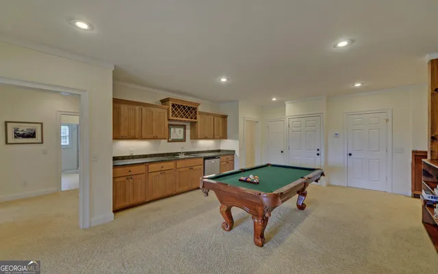 a view of a livingroom with furniture and a fireplace