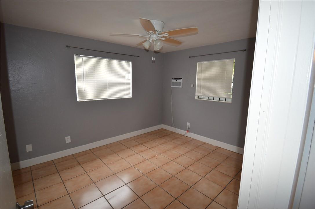 807 Phippen Waiters Road, Unit 1 Dania Beach, FL 33004 - Photo 3 of 6 a view of an empty room