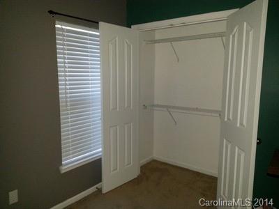 1109 Garrison Road Charlotte, NC 28262 - Photo 18 of 22 a view of an empty room with a window