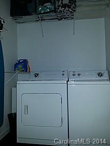 1109 Garrison Road Charlotte, NC 28262 - Photo 20 of 22 a utility room with dryer and washer