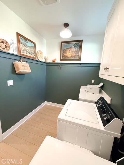 27628 Exploration Newhall, CA 91381 - Photo 13 of 15 a utility room with dryer and washer