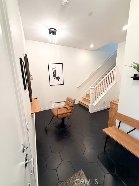 27628 Exploration Newhall, CA 91381 - Photo 6 of 15 a living room with furniture and a stairs