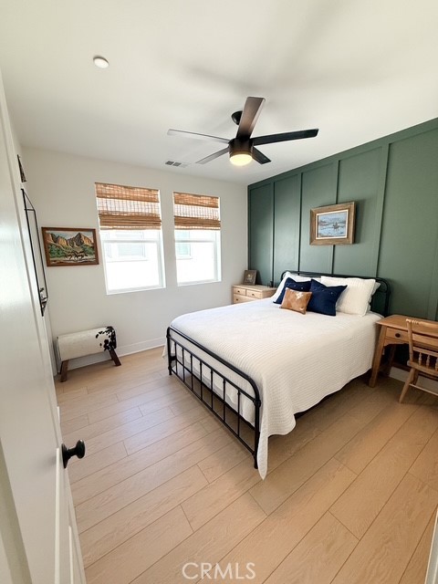 27628 Exploration Newhall, CA 91381 - Photo 7 of 15 a bedroom with a bed and a window