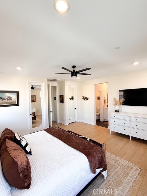 27628 Exploration Newhall, CA 91381 - Photo 8 of 15 a bedroom with a bed and a couch