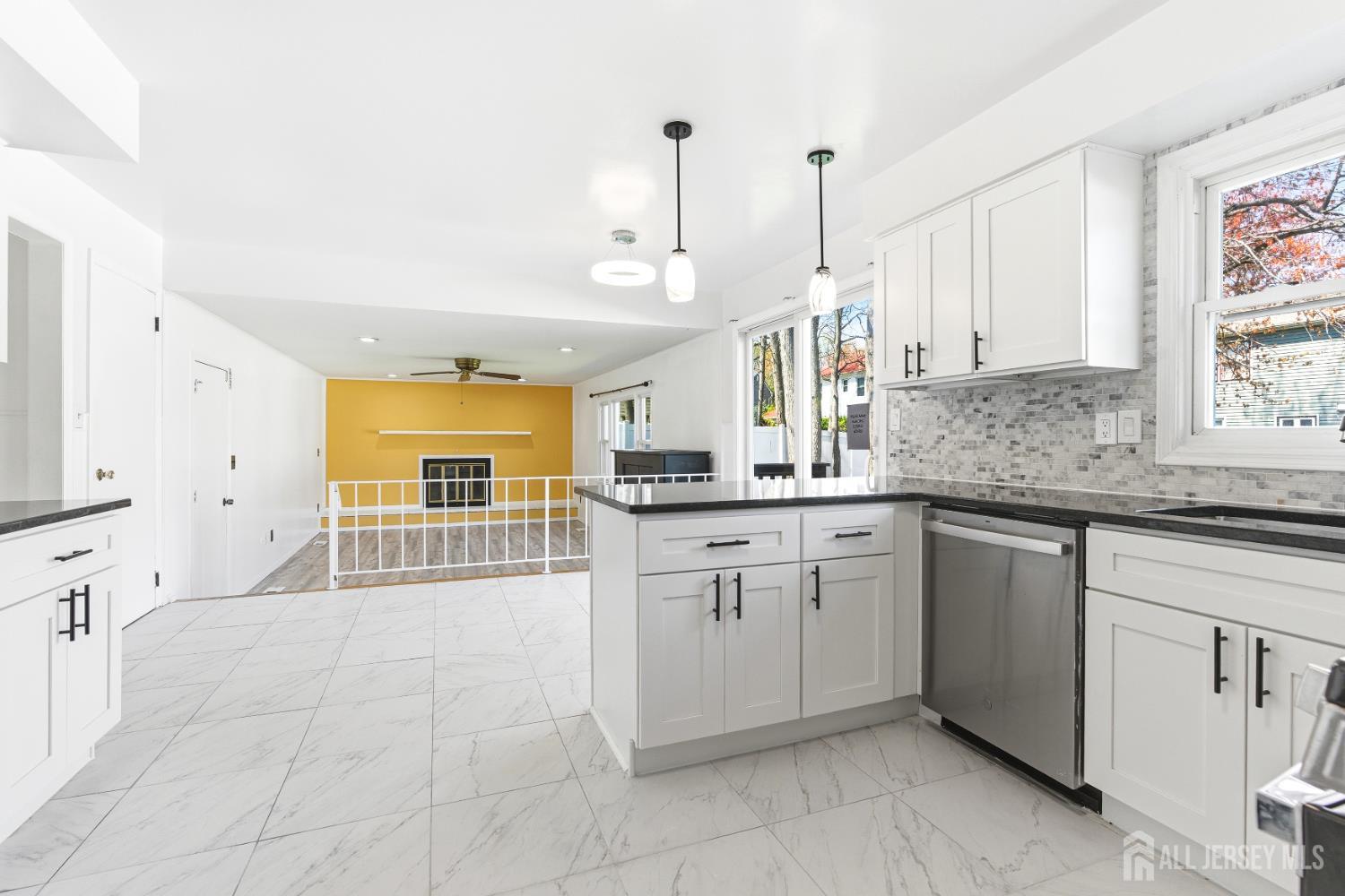 7 Oberlin Court Edison, NJ 08820 - Photo 13 of 45 a kitchen with stainless steel appliances granite countertop a sink and cabinets